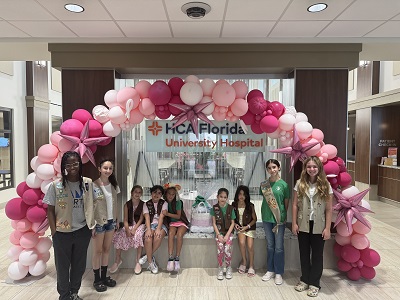 HCA Florida University Hospital  Girl Scouts of Southeast Florida Celebrate Founder’s Legacy with Heartwarming Gift Basket for Newborn Girl